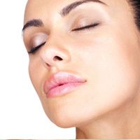 woman closing her eyes